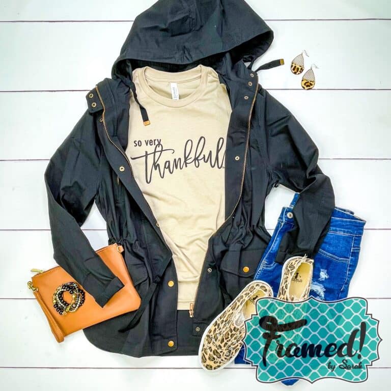 Tan "Oh So Thankful" graphic tshirt styled with a black hooded jacket, leopard print shoes, and a camel purse