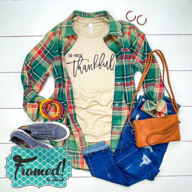 Tan "Oh So Thankful" graphic tshirt styled with a colorful flannel and camel purse and gray shoes