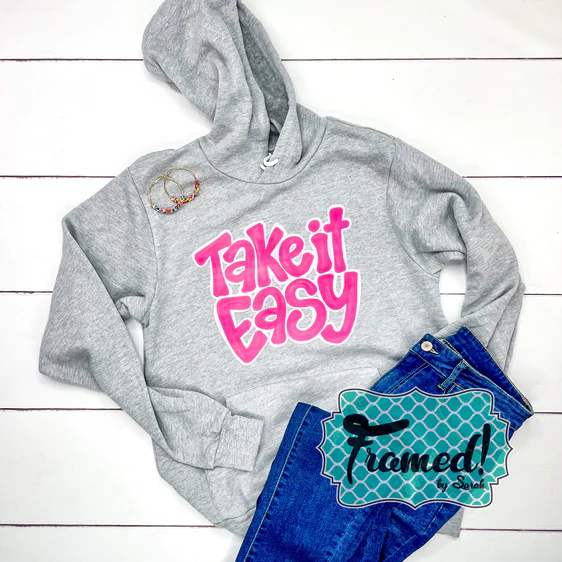 Gray Take It Easy Super Soft Hoodie on white background styled with jeans