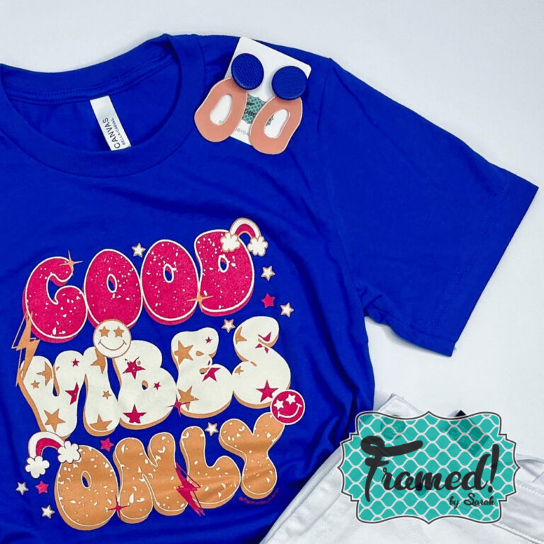 Good Vibes Only cobalt tee and blue and gold earrings