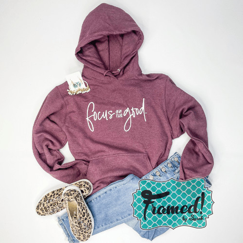 Focus on the good Heather Maroon Hoodie Styled with Jeans, leopard sneakers, earrings _September 2023 Monogram Box Framed by Sarah