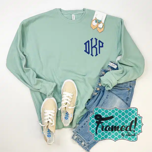 Monogrammed Ultra Soft Sweatshirt in dusty blue with navy monogram styled with ivory sneakers, jeans, wood drop earrings