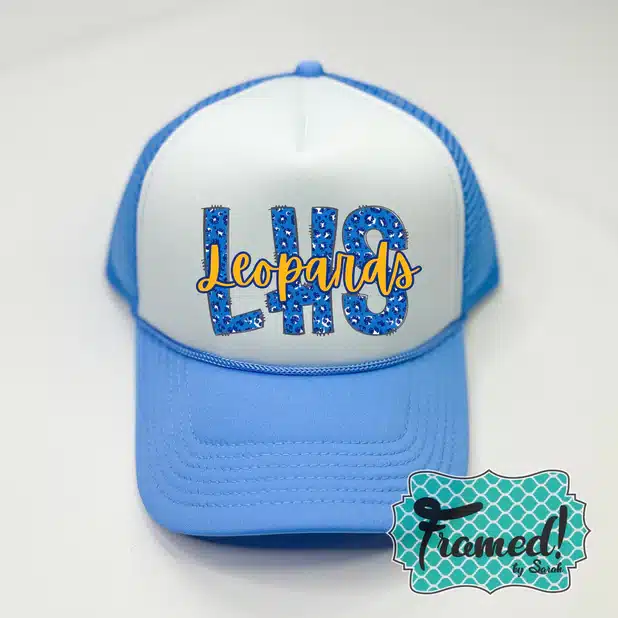 blue trucker hat with blue leopard lettering for team sports