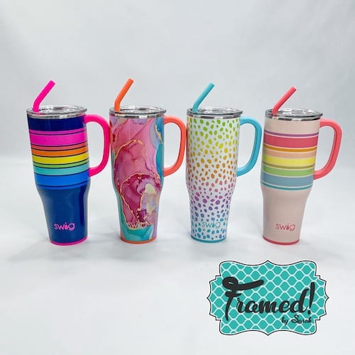 row of Swig Mega Mugs in multiple prints with straws